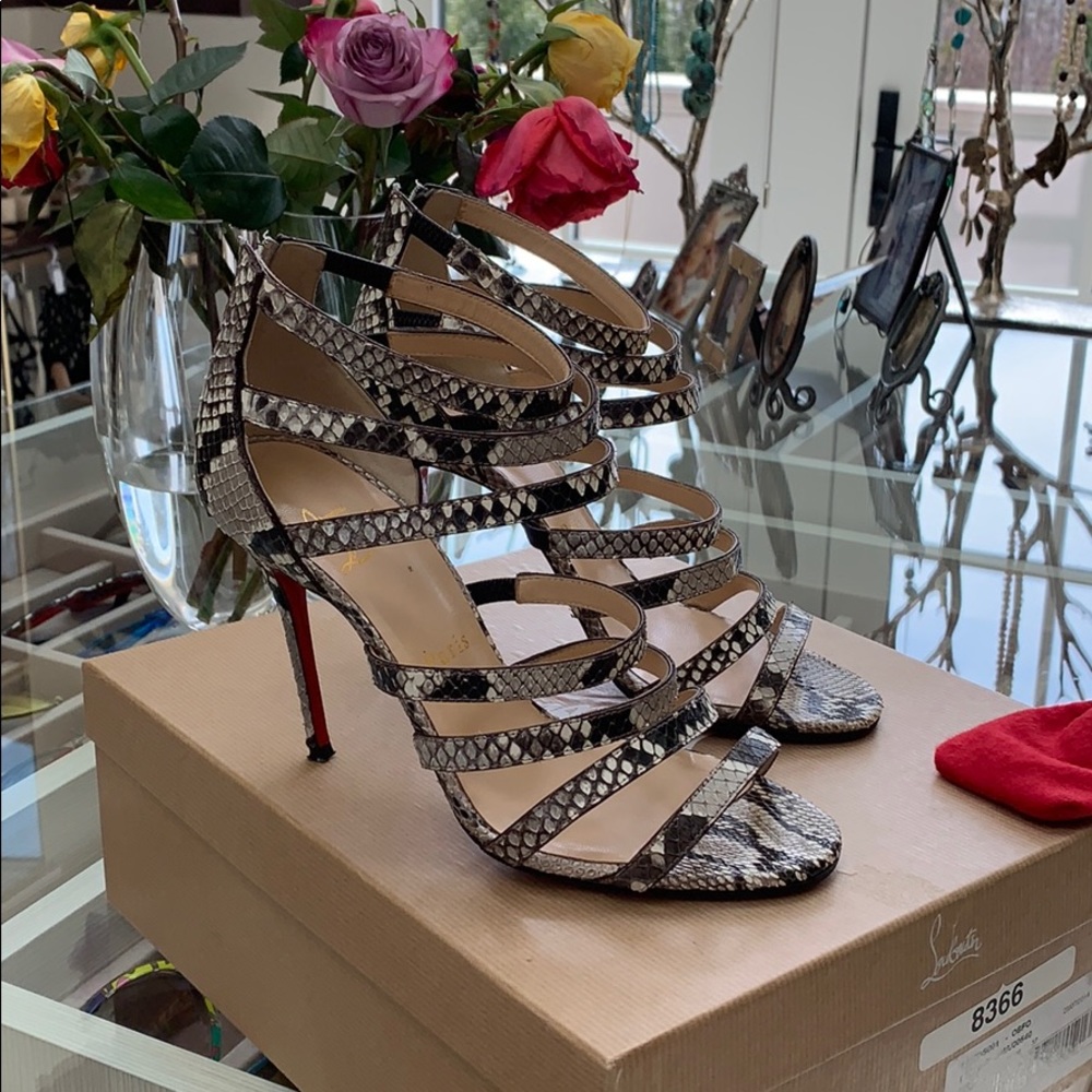 Christian Louboutin Covered heel measures 4”